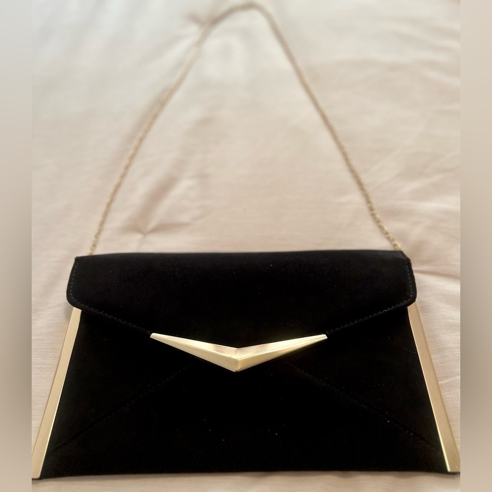 Black and gold envelope purse/clutch worn on my profile picture.